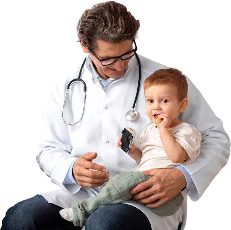 Pediatrician consulting with child